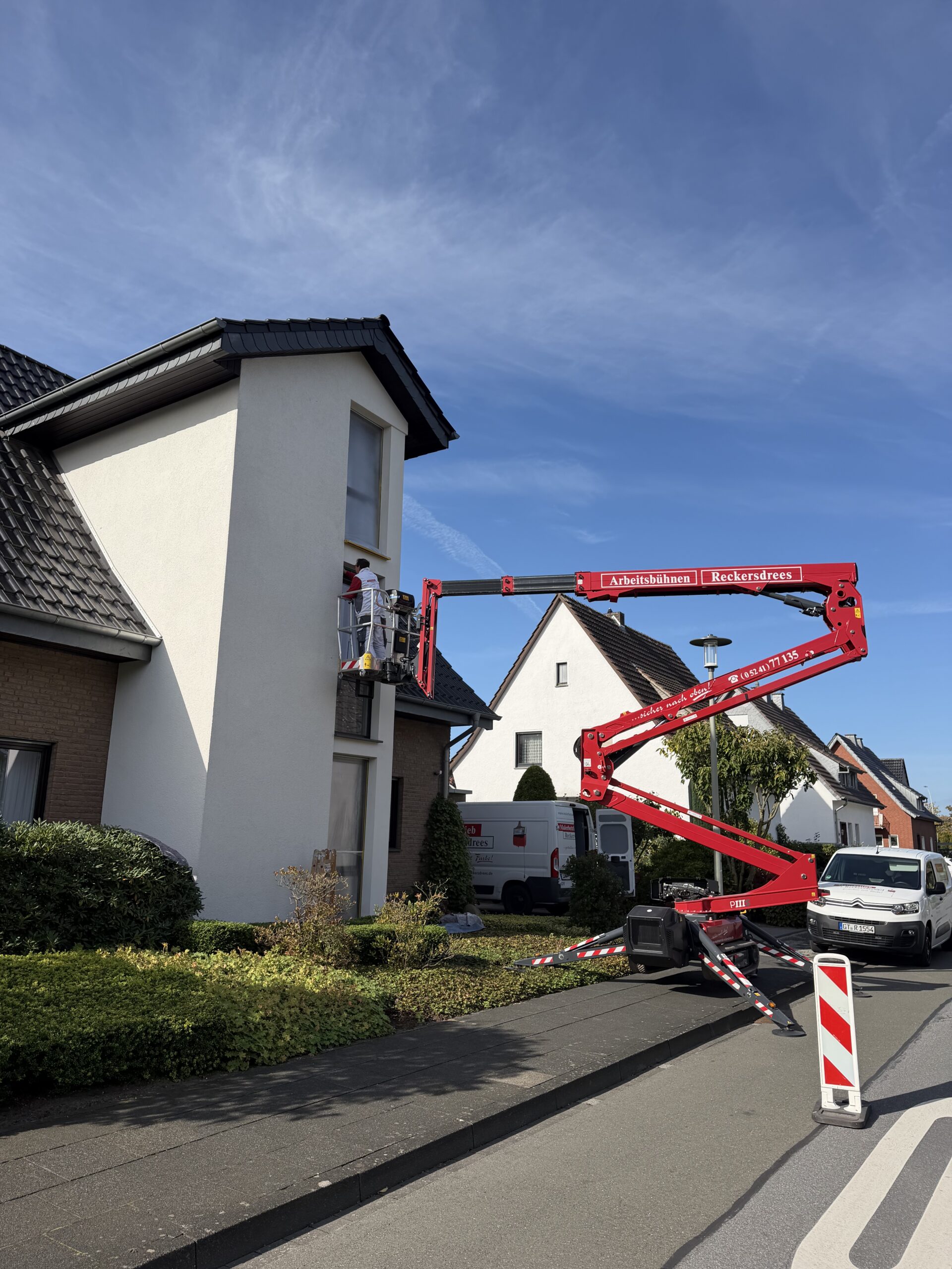 Fassadengestaltung einer Wohnhausfassade vom Malerbetrieb Reckersdrees in Gütersloh